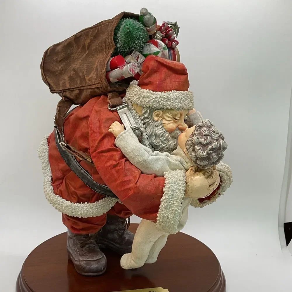Clothtique Santa and Child Sculpture - Saturday Evening Post